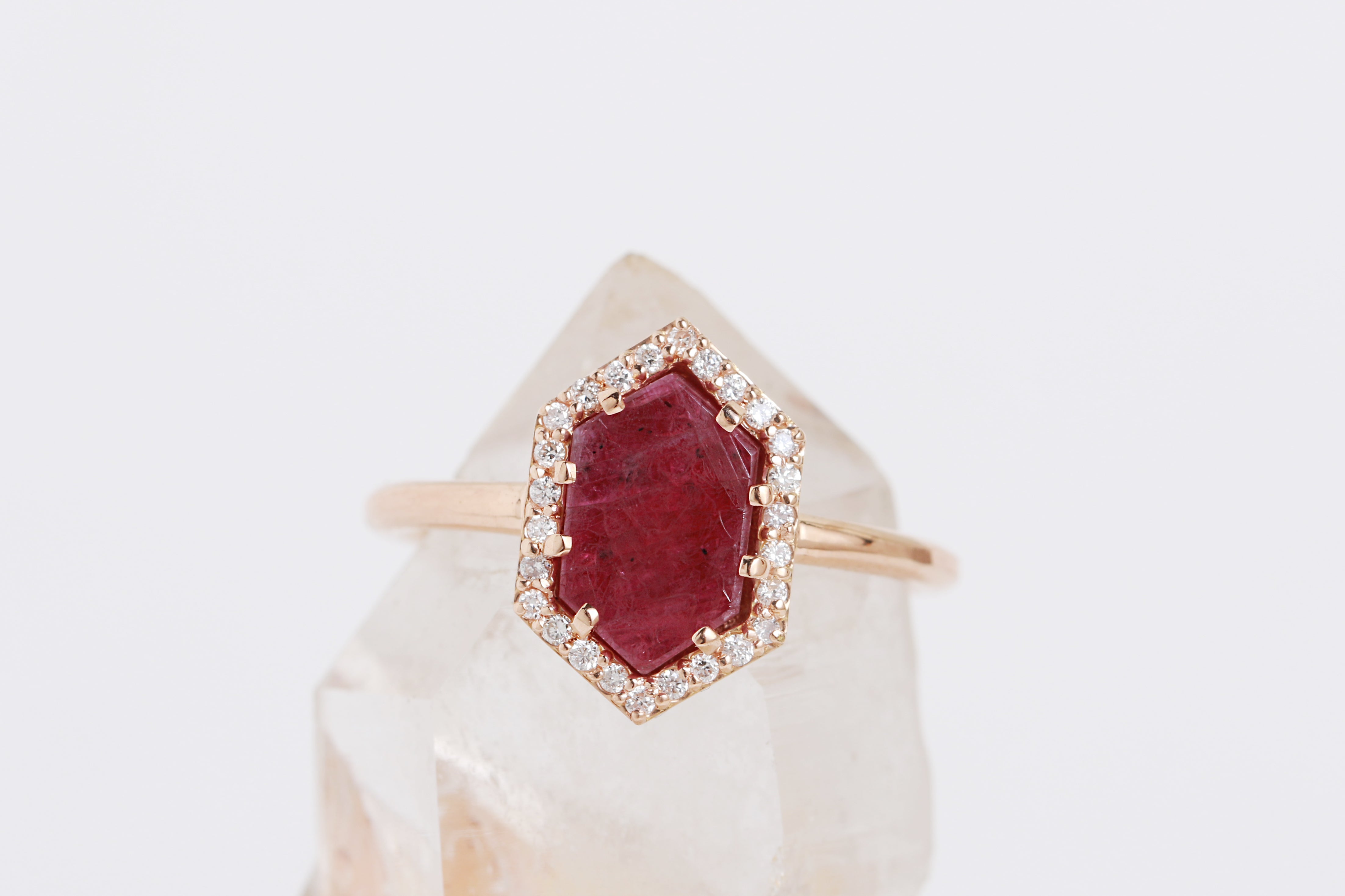 ruby ring with pavé diamond halo 