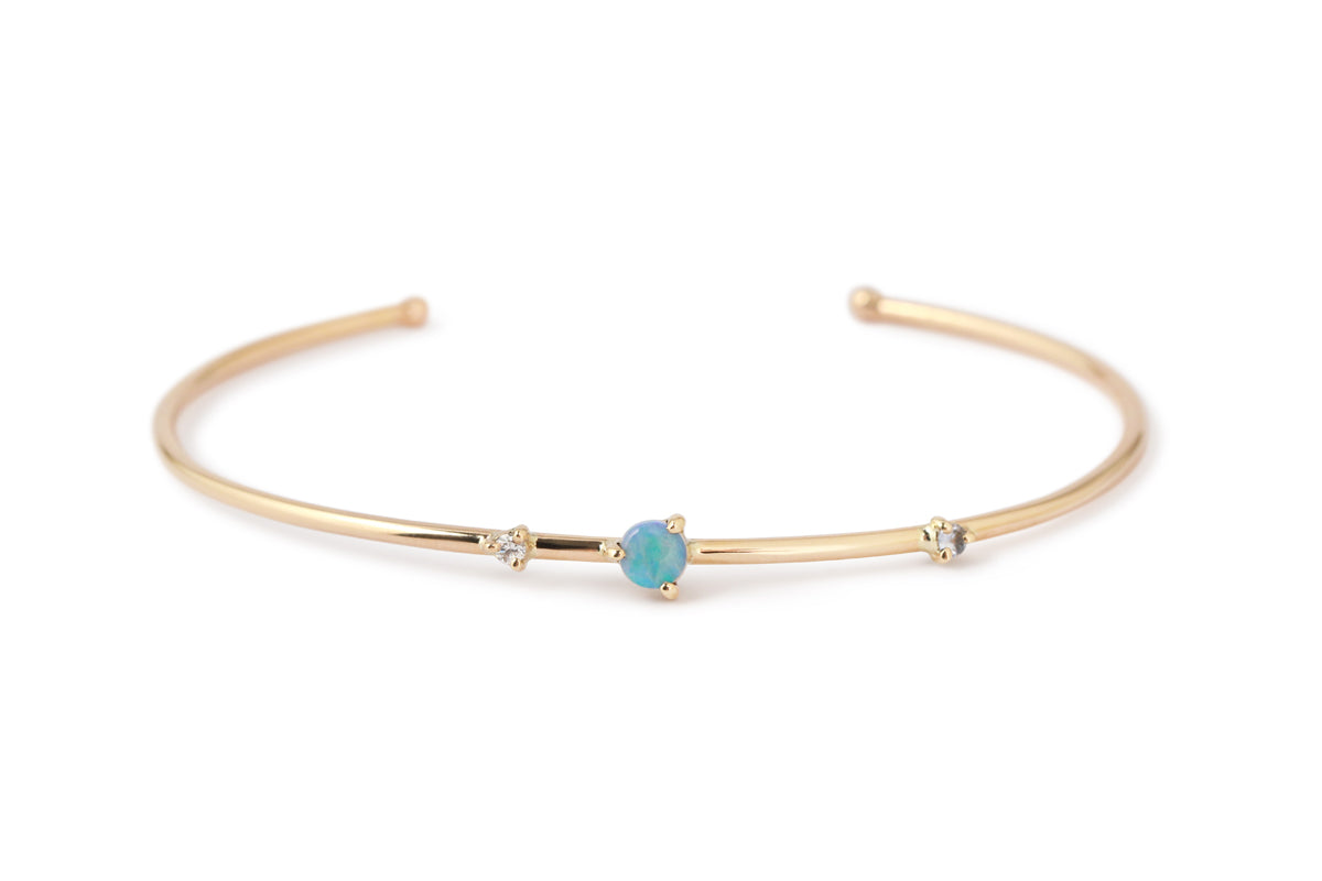 Three-Stone Opal Cuff by WWAKE BRACELET 756A2568_731f7d57-edd6-4239-b8d9-aee3ce87219e