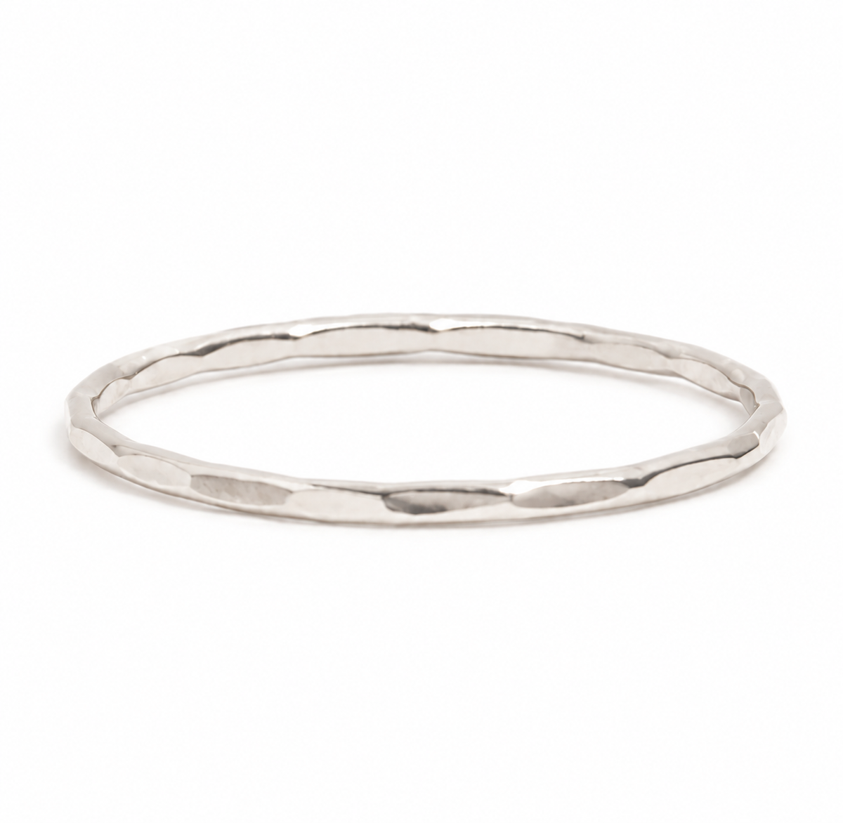 Thin Single Stacking Ring White Gold Stock Ring Hammered_Silver_Bangle_on_White