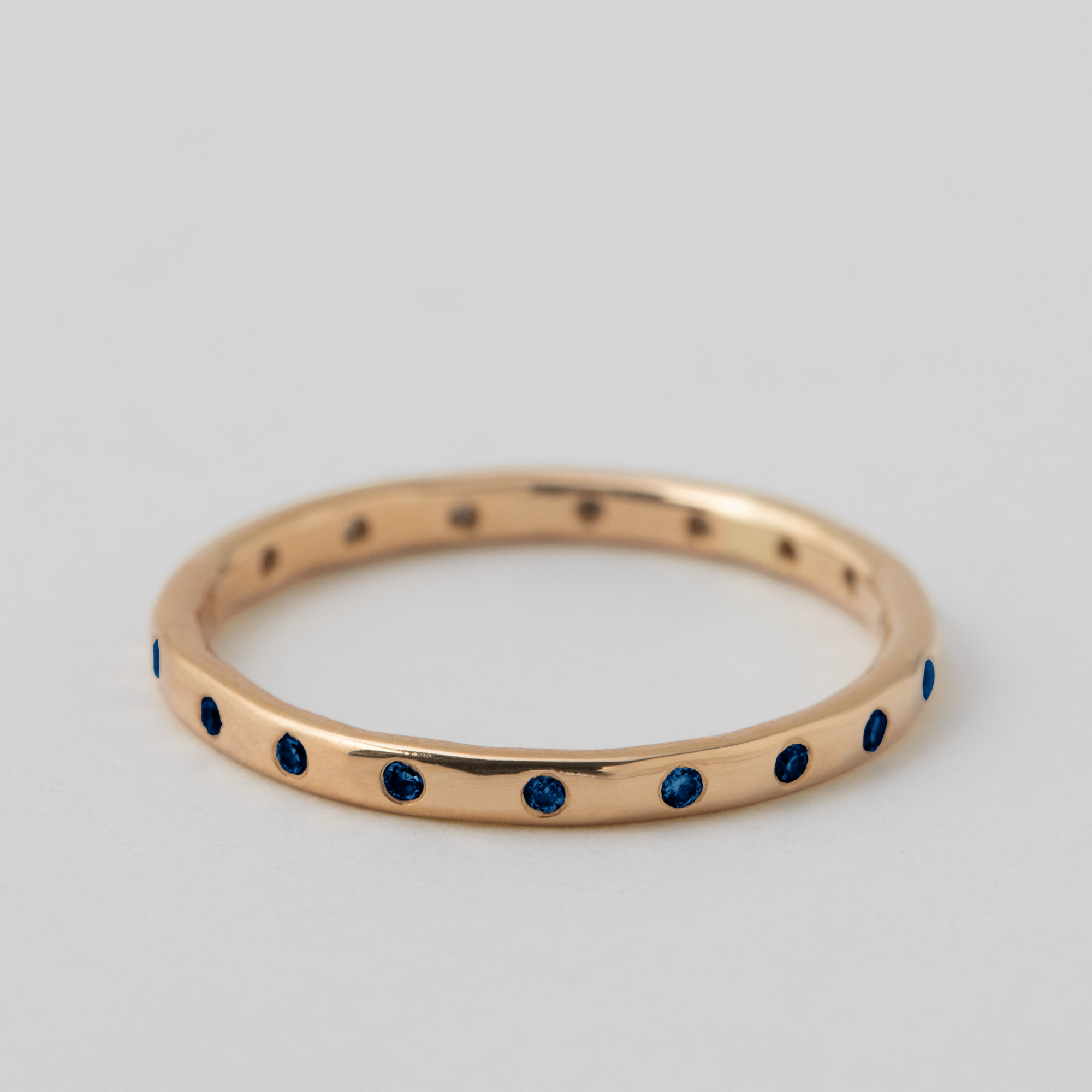 Flush Set 18 Blue Sapphire Band - 18k Rose Gold HIDDEN LR483PG-18